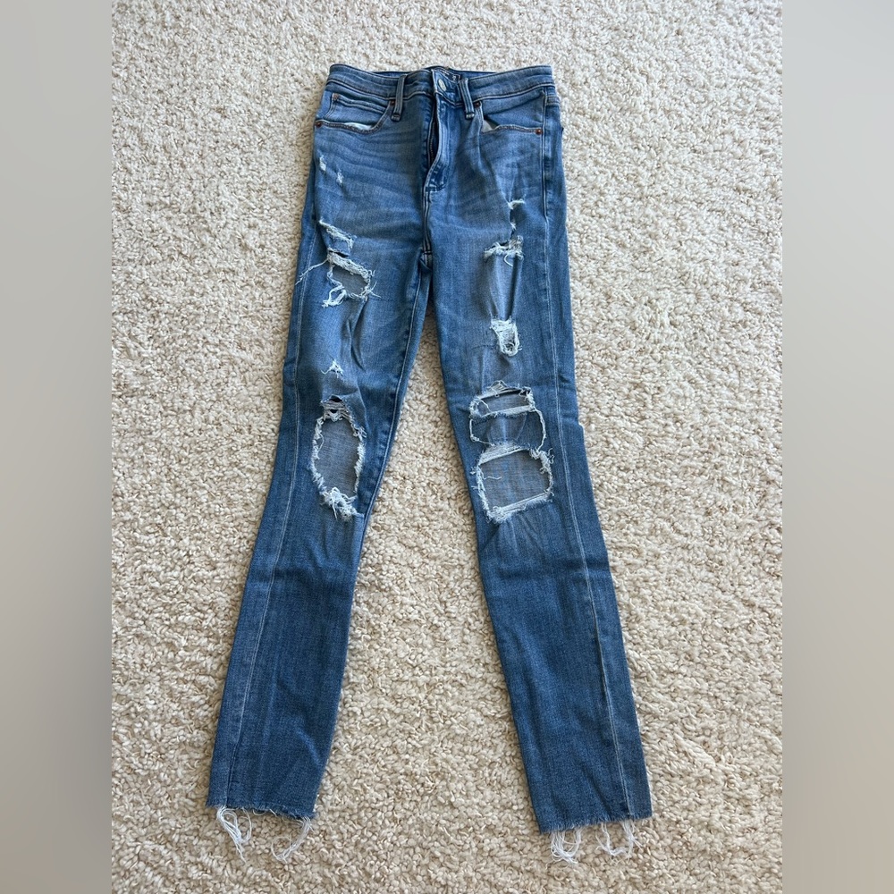 blue ripped jeans